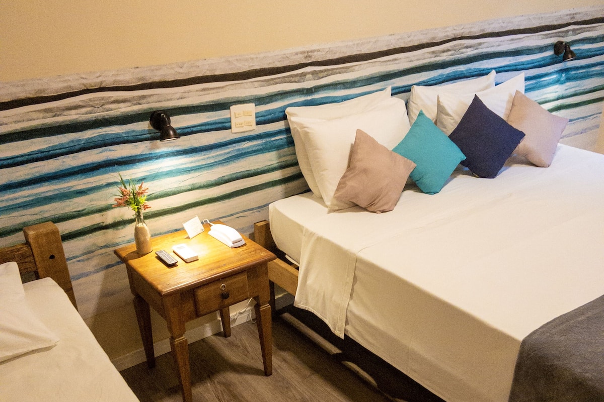 Quadruple Room | Minibar, iron/ironing board, free WiFi, bed sheets