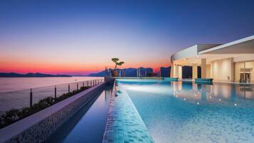 Indoor pool, 2 outdoor pools, pool umbrellas, sun loungers