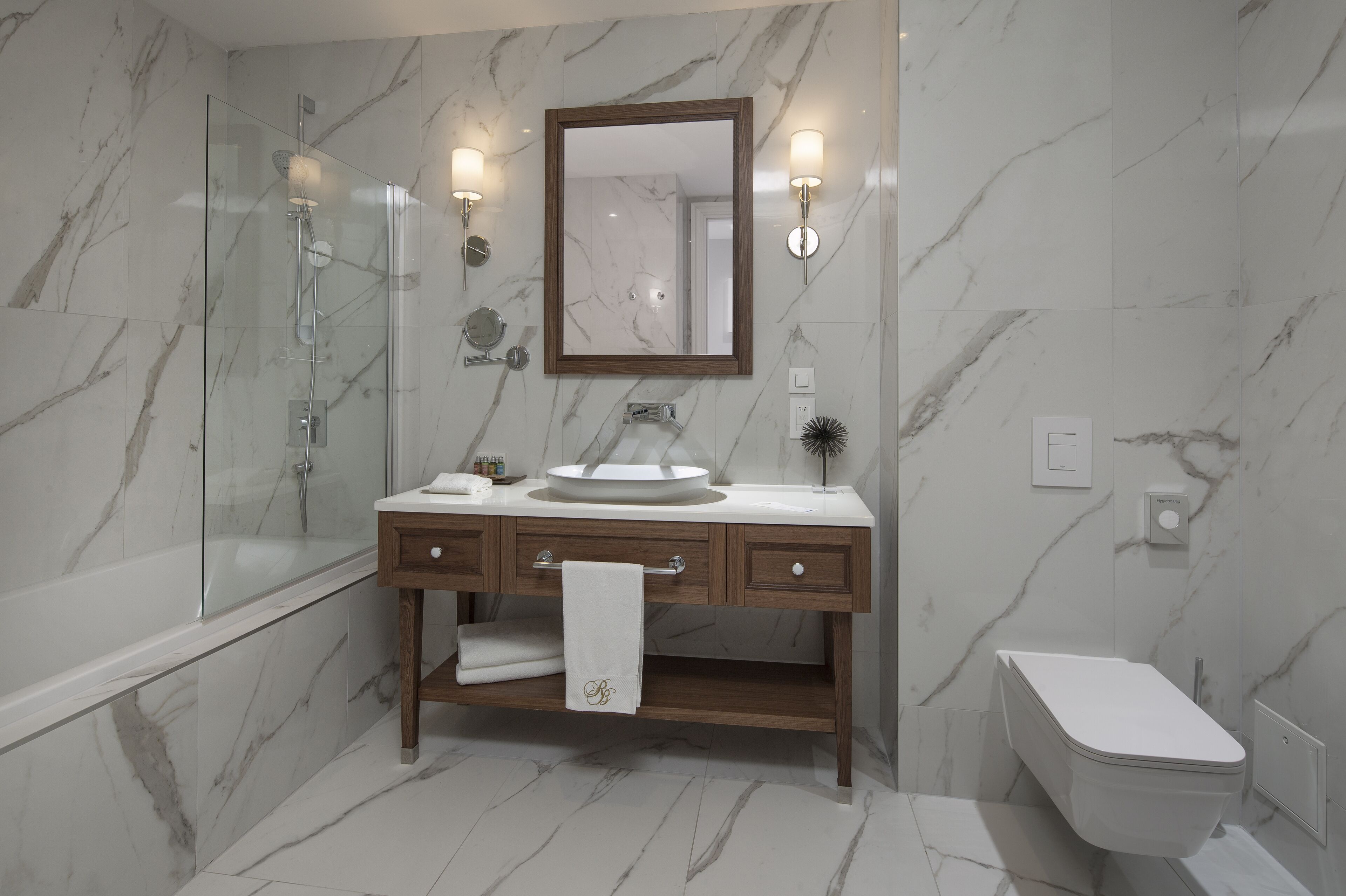 deluxe quadruple room, 2 queen beds, balcony | bathroom | bathtub, designer toiletries, hair dryer, bathrobes