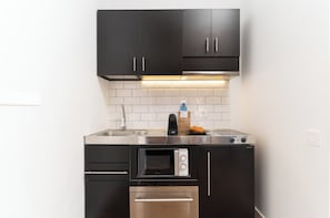 Apartment, 1 Bedroom, Balcony | Private kitchen | Coffee/tea maker, fridge, microwave, oven - La Mare by The Streets (Barcelona)