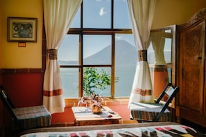 Economy Double Room, 1 Double Bed, Shared Bathroom | In-room safe, individually decorated, individually furnished, desk