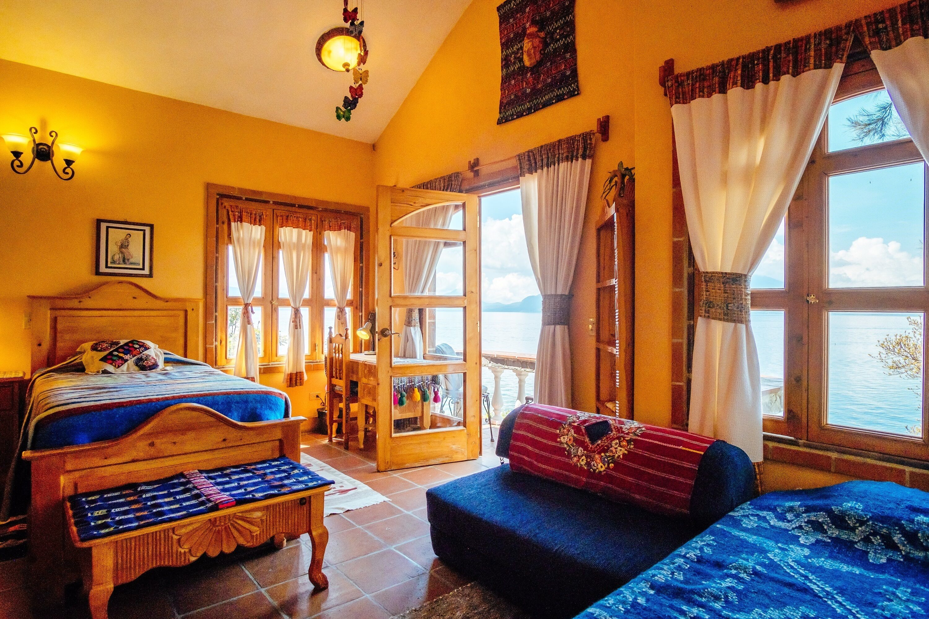 deluxe suite, multiple beds, balcony, lake view | in-room safe, individually decorated, individually furnished, desk