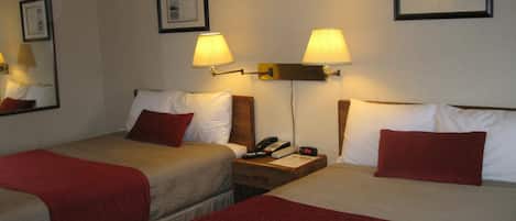 Luxe beddengoed, verduisterende gordijnen, een strijkplank/strijkijzer