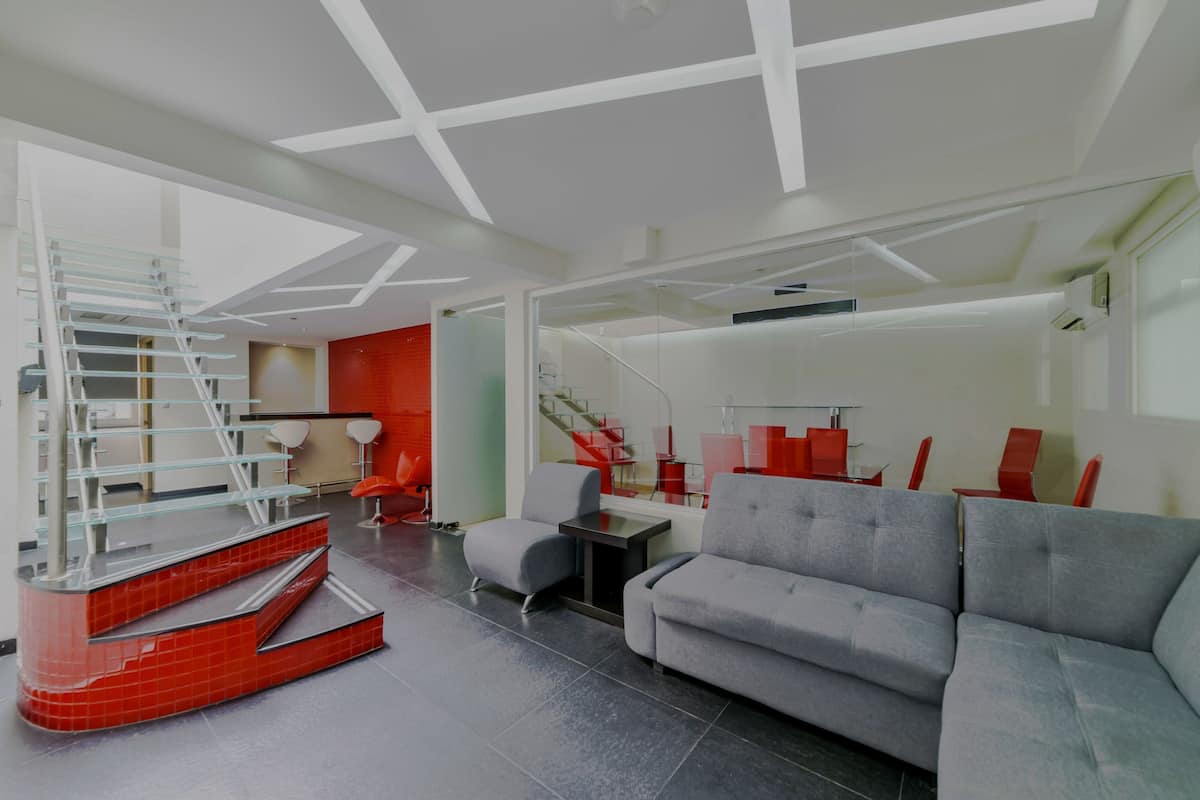 Suite, 1 King Bed, Non Smoking | In-room safe, desk, laptop workspace, blackout drapes