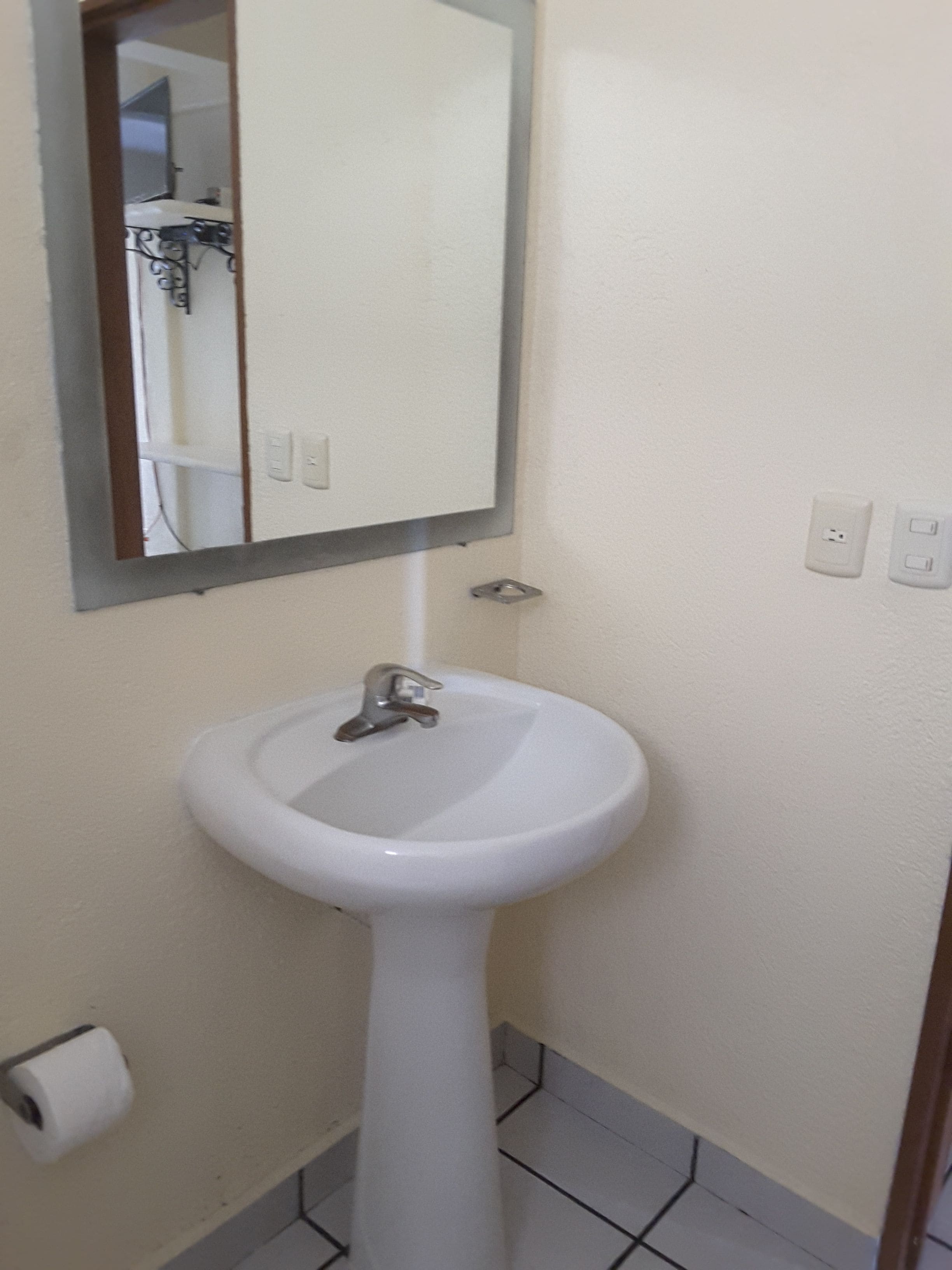 room, 2 double beds | bathroom sink