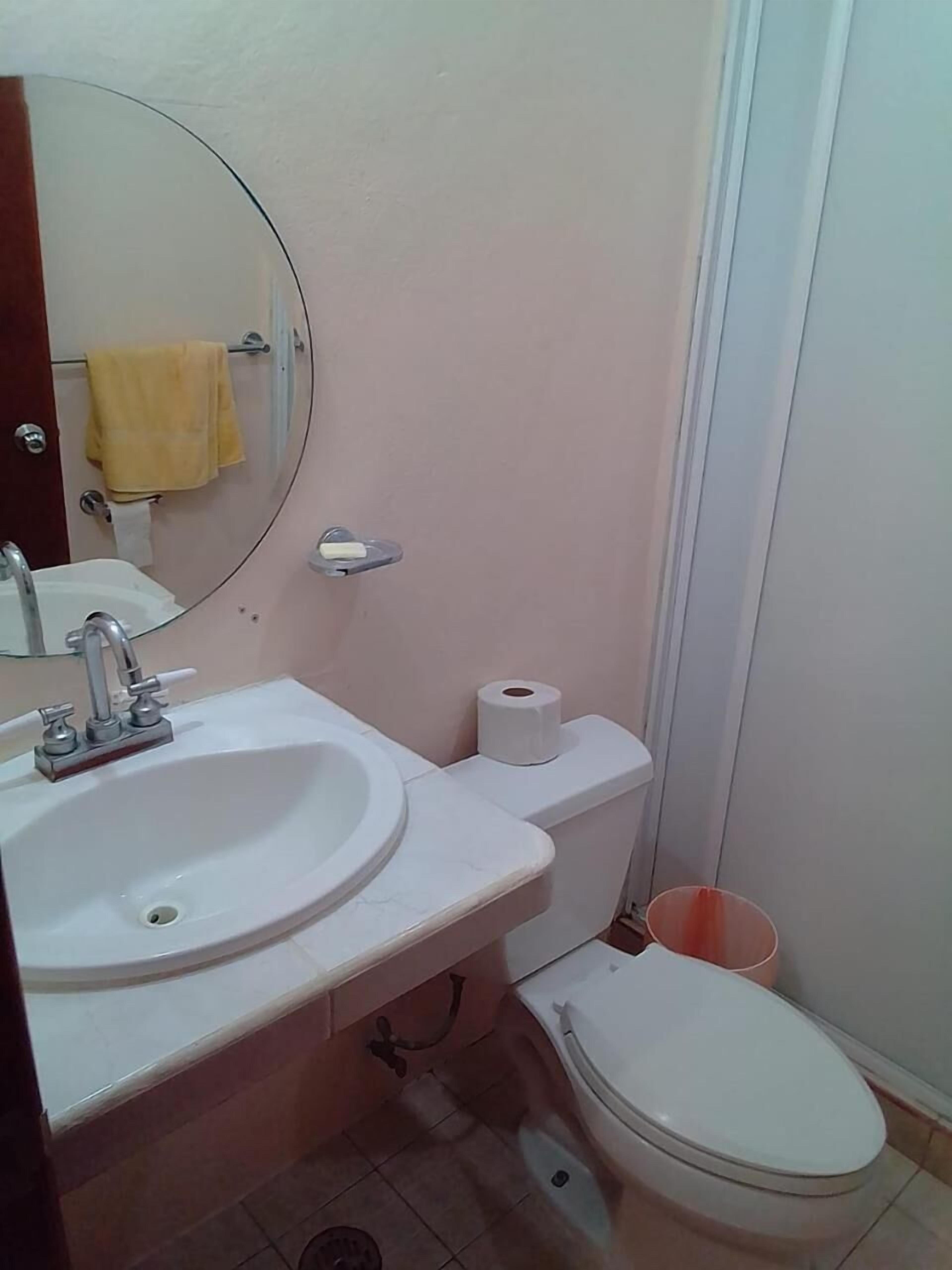 shower, designer toiletries, towels