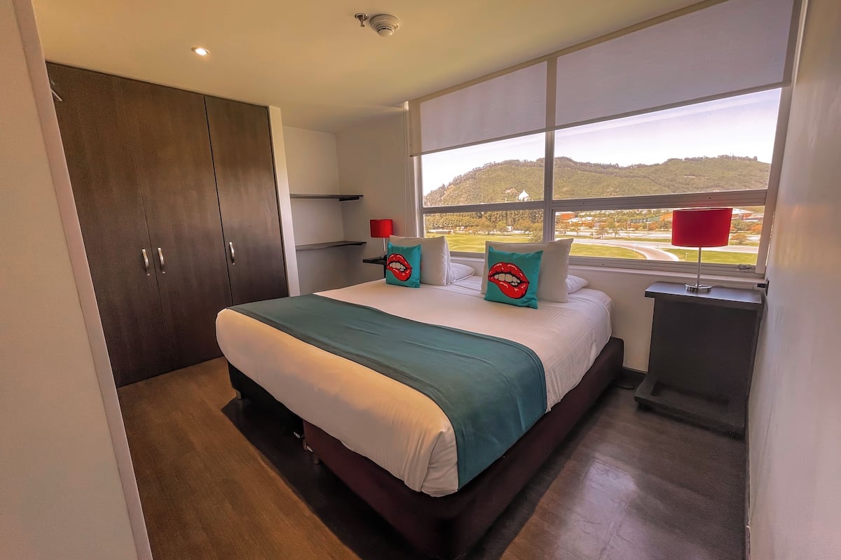 junior suite | 1 bedroom, in-room safe, desk, blackout curtains