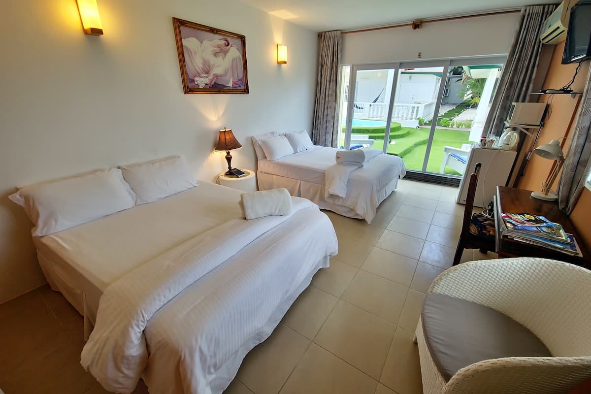 Standard Pool View with Balcony | Premium bedding, in-room safe, desk, free cots/infant beds