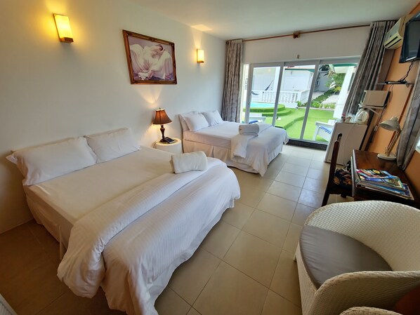 Standard Pool View with Balcony  | Premium bedding, in-room safe, desk, free cribs/infant beds