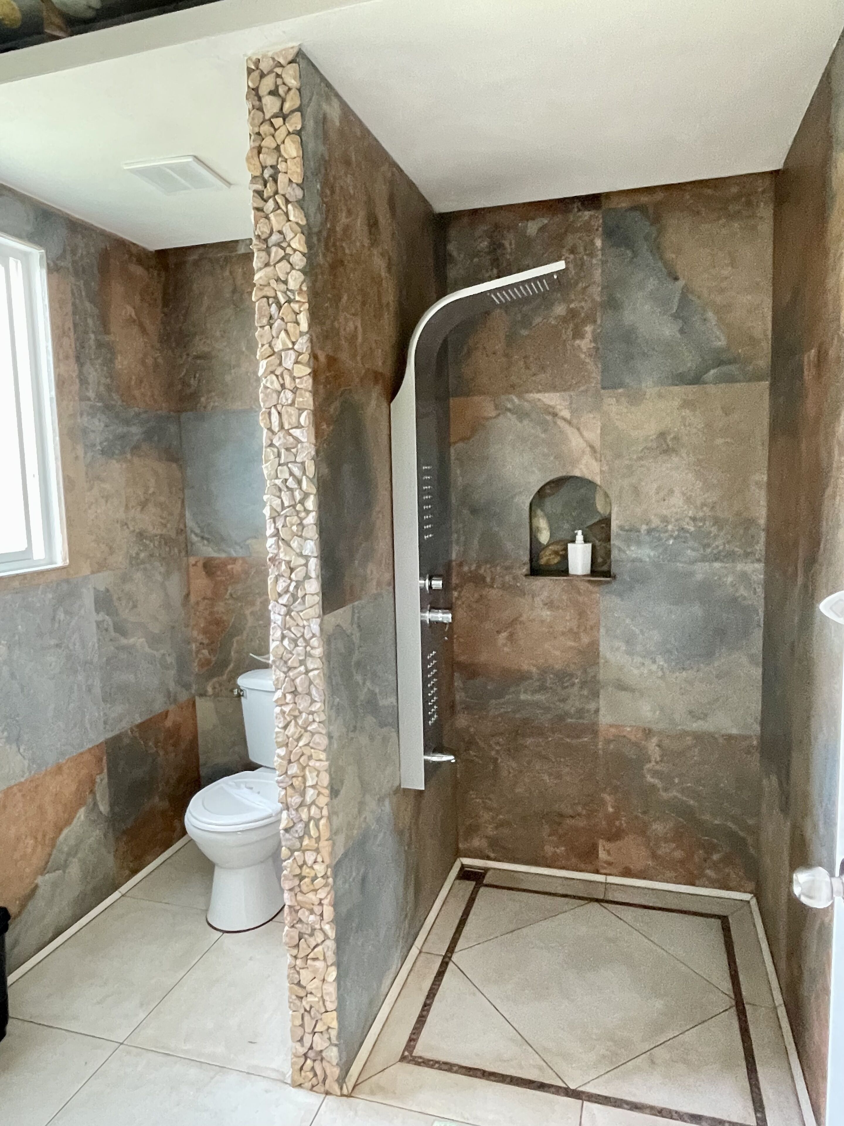 family double room | bathroom | shower, hydromassage showerhead, eco-friendly toiletries, towels