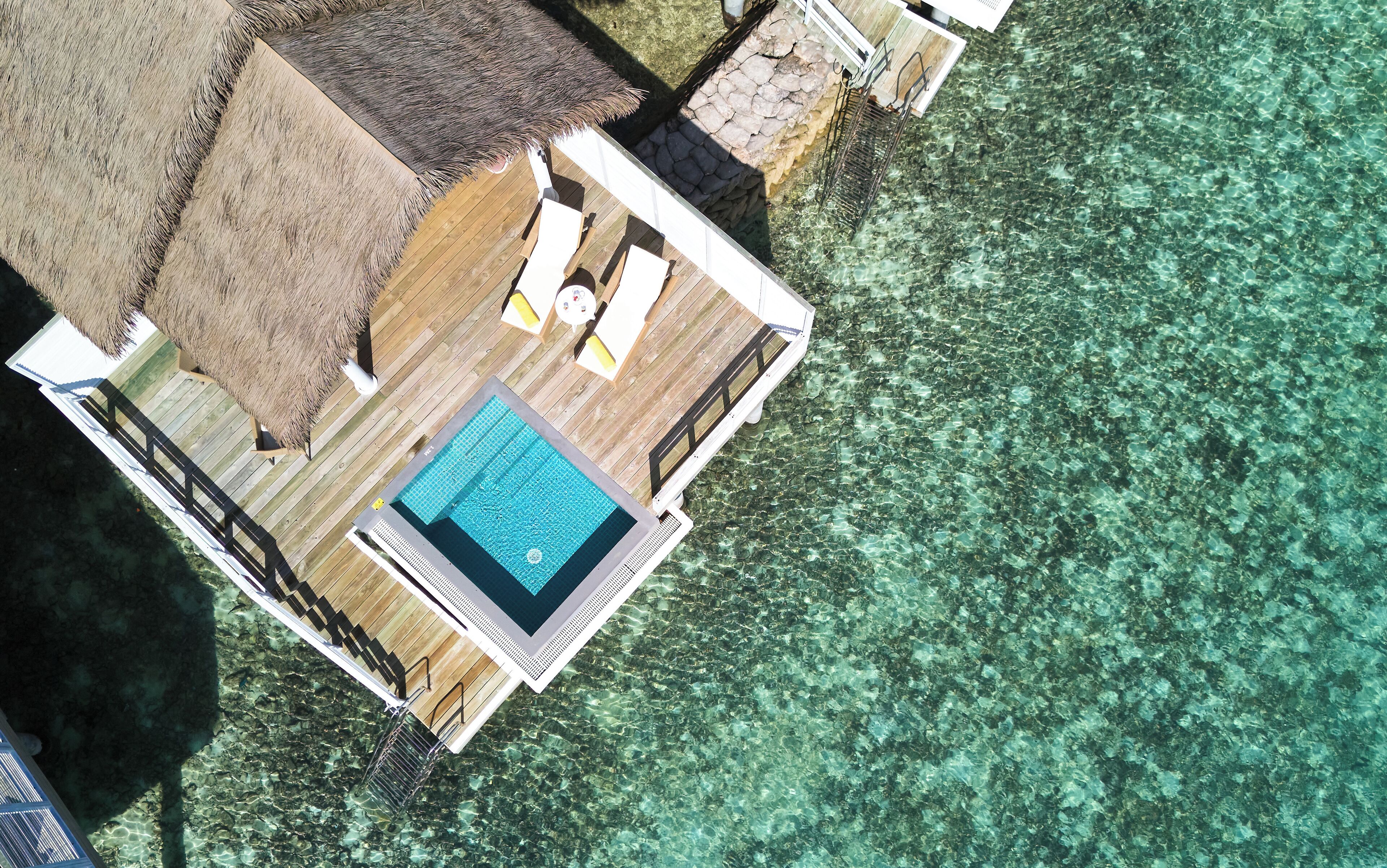 Over Water Villa with Private Pool | Premium bedding, down duvets, memory-foam beds, minibar