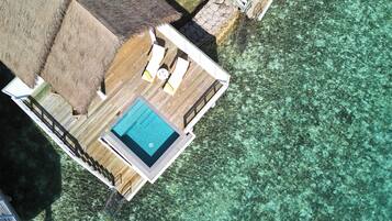 Over Water Villa with Private Pool | Premium bedding, down duvets, memory-foam beds, minibar