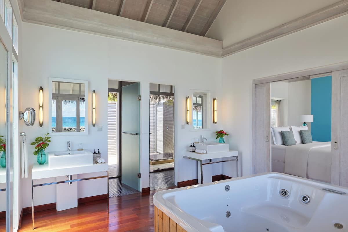 over water suite with private pool | bathroom | combined shower/bathtub, jetted bath, rainfall showerhead
