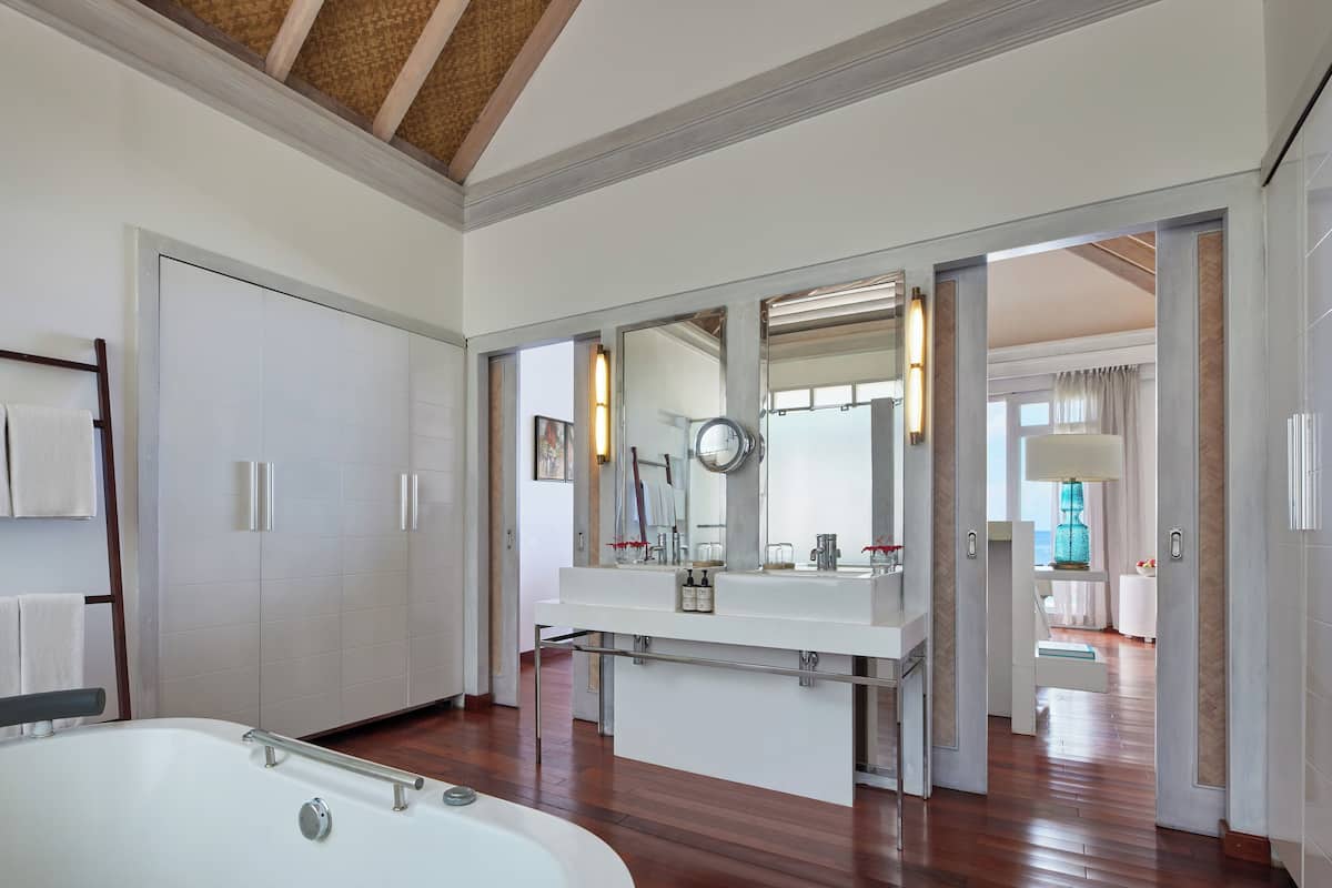 over water villa with private pool | bathroom | combined shower/bathtub, jetted bath, rainfall showerhead