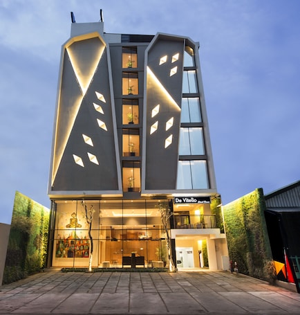 Front of property - evening/night. Yellow Star Ambarukmo Hotel