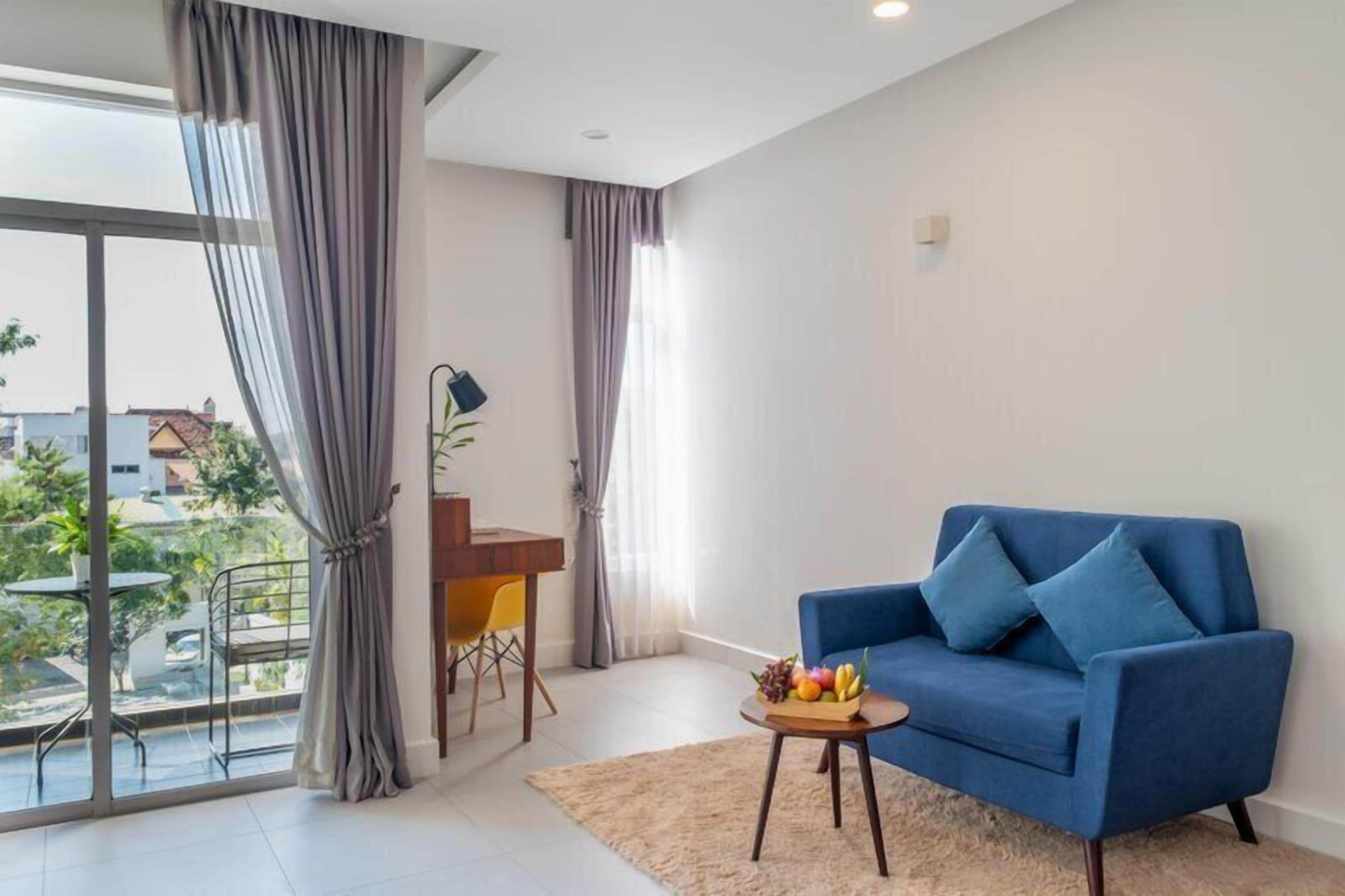 Chambre Double Supérieure, vue piscine | Coin séjour