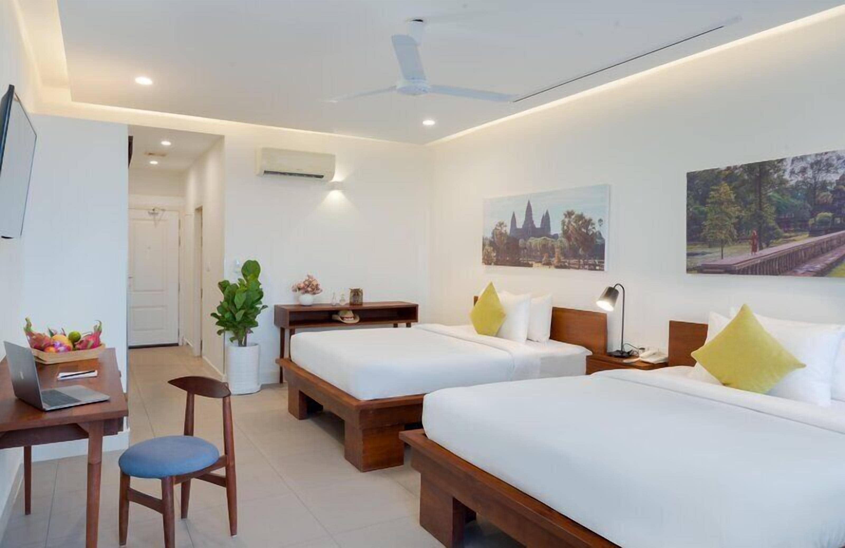 Superior Twin Room, Pool View | Minibar, in-room safe, desk, blackout drapes