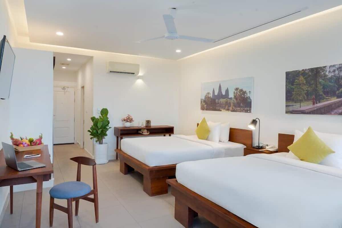 Superior Twin Room, Pool View | Minibar, in-room safe, desk, blackout drapes