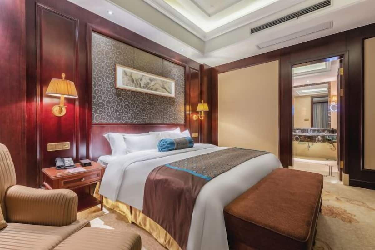 Ropa de cama de alta calidad, minibar, caja fuerte y escritorio