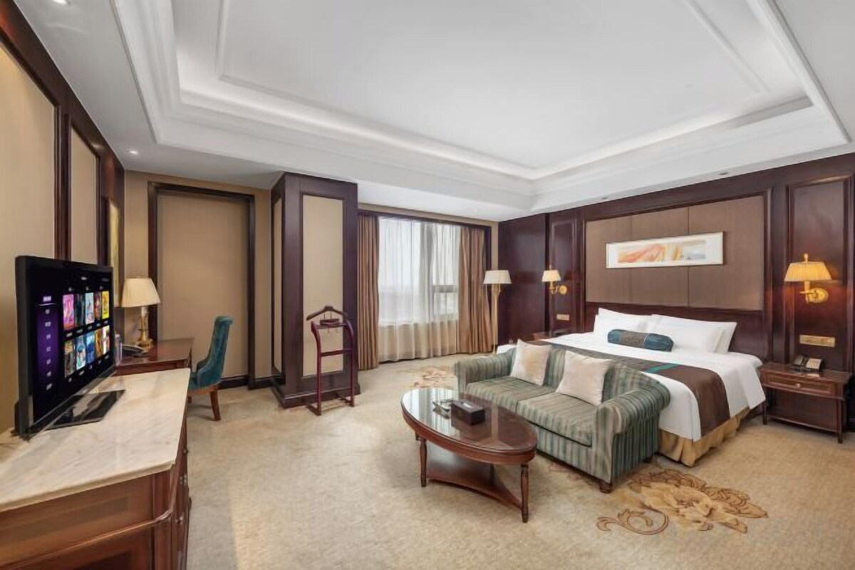Luxe beddengoed, een minibar, een kluis op de kamer, een bureau