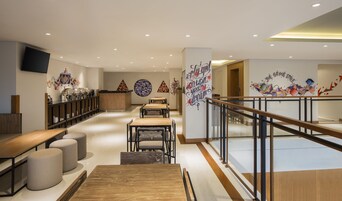 Breakfast, lunch, dinner served; local and international cuisine 