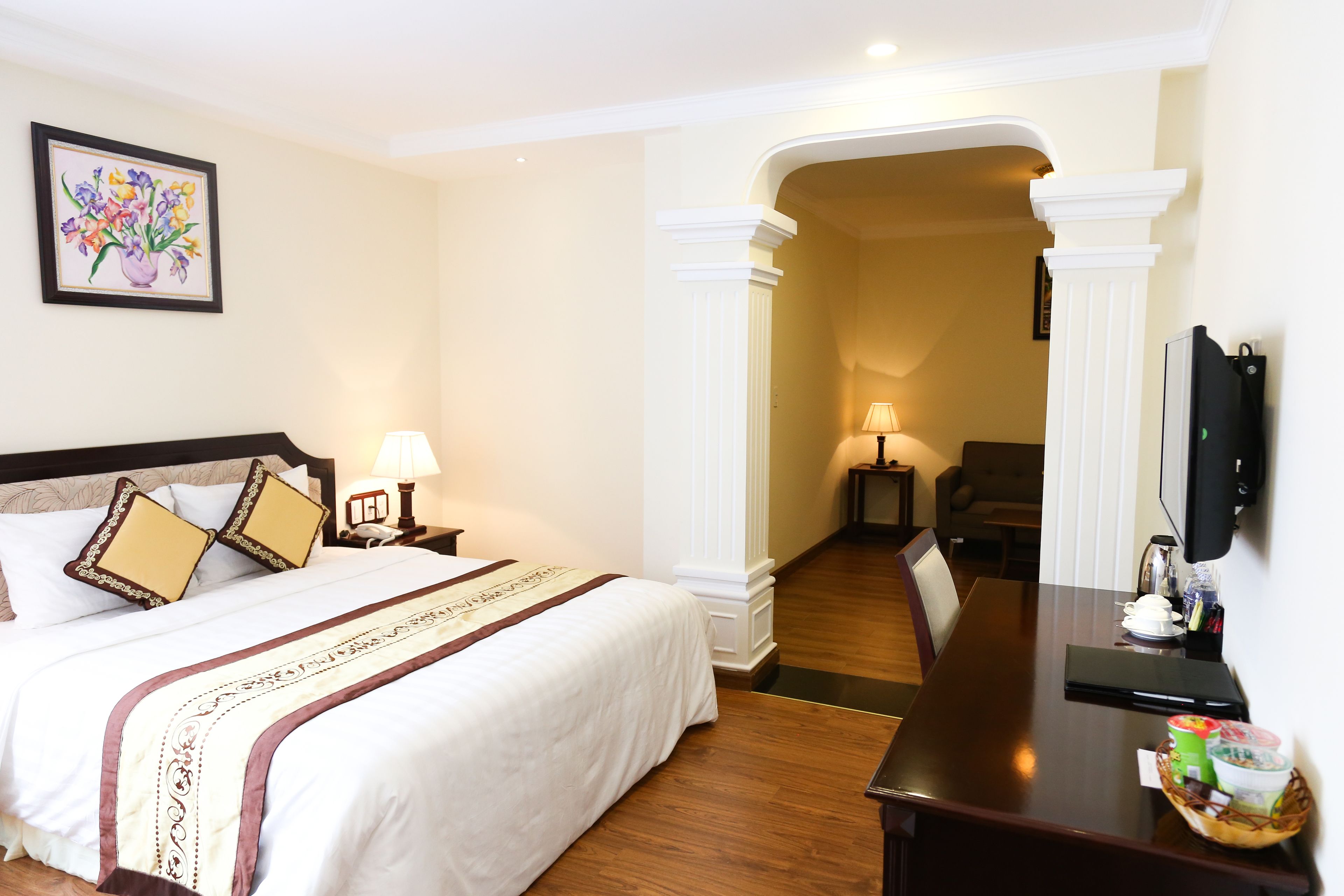 superior living room | minibar, in-room safe, desk, blackout curtains