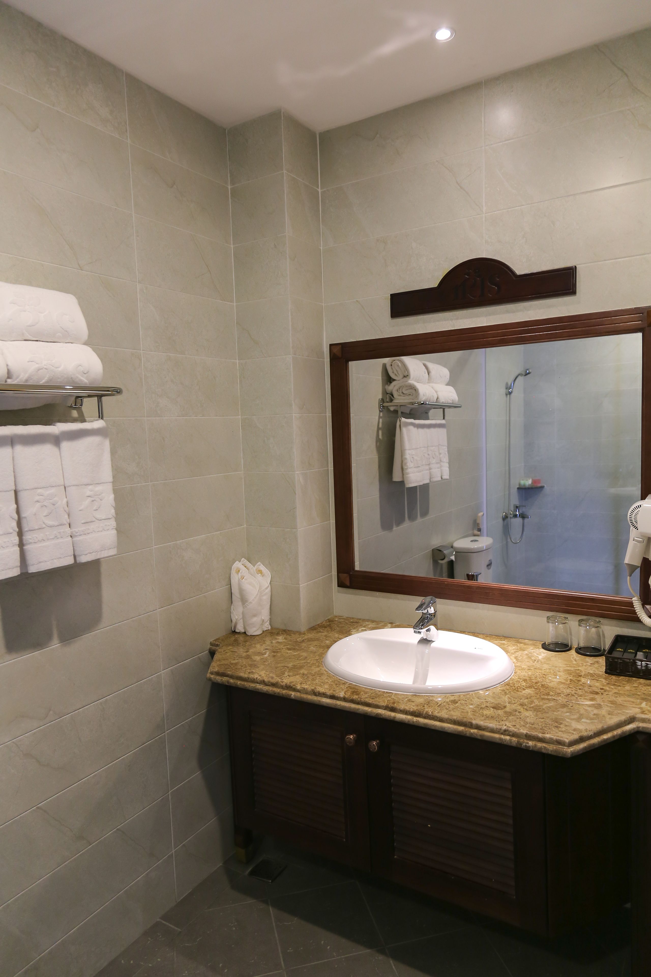 deluxe family room  | bathroom | shower, free toiletries, hair dryer, slippers