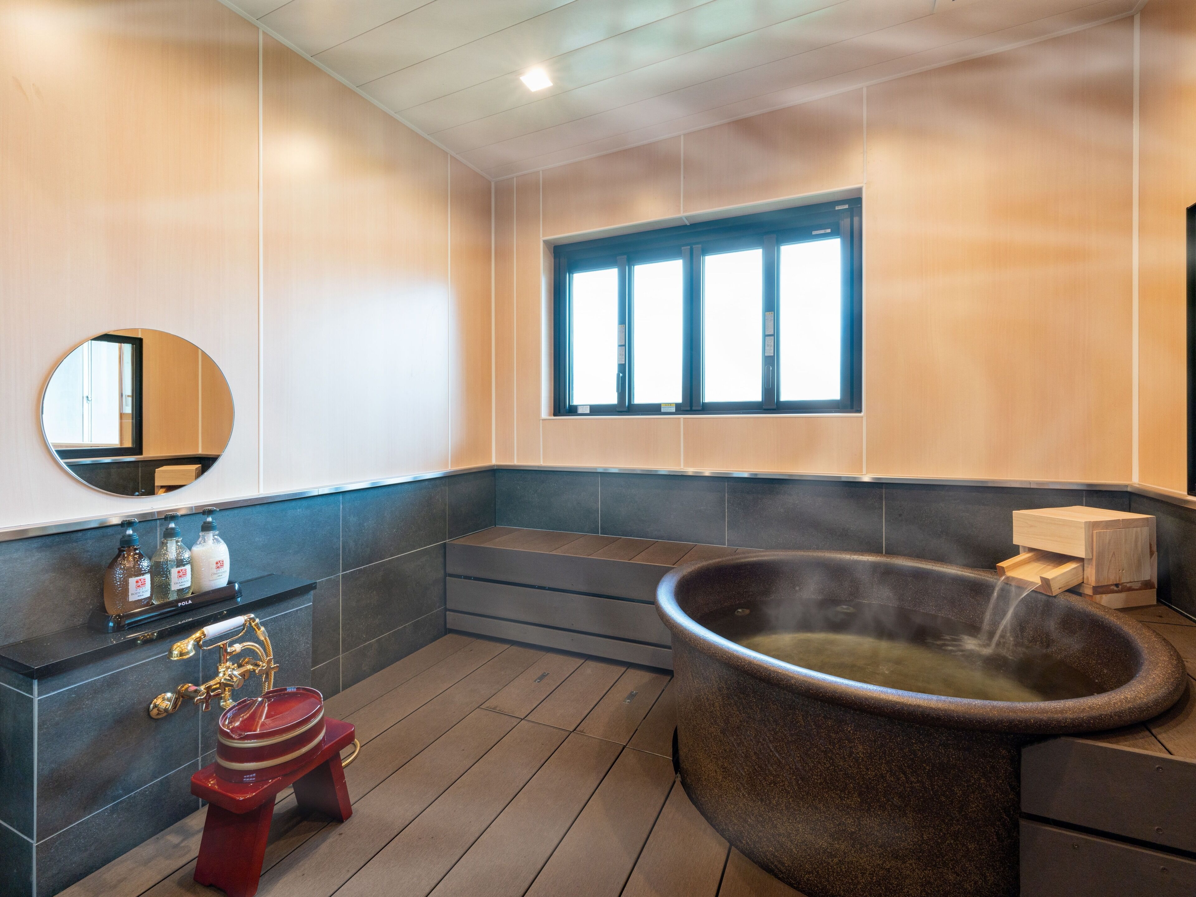 guest room with a new half-open-air bath [akadake] - non-smoking room | bathroom | deep-soaking bathtub, free toiletries, hair dryer, slippers