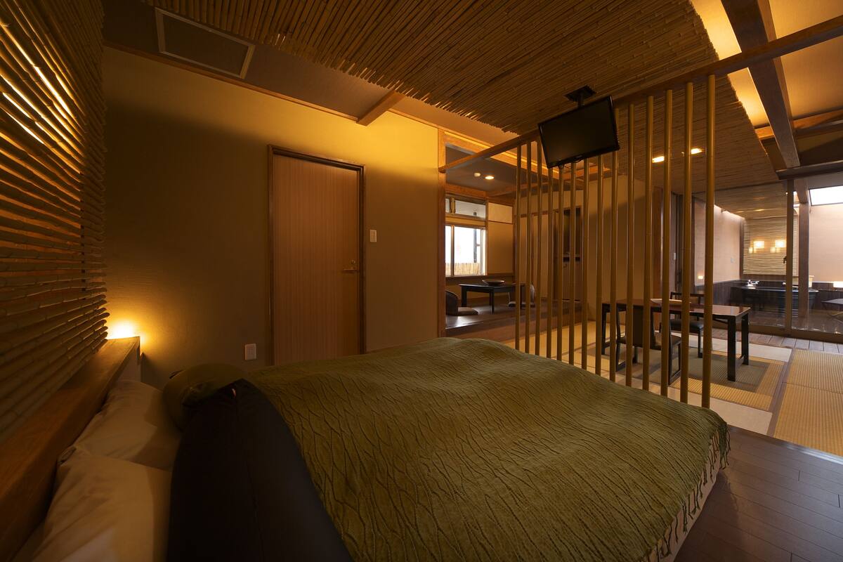 double room with tatami area with open-air bath | premium bedding, in-room safe, blackout curtains, soundproofing