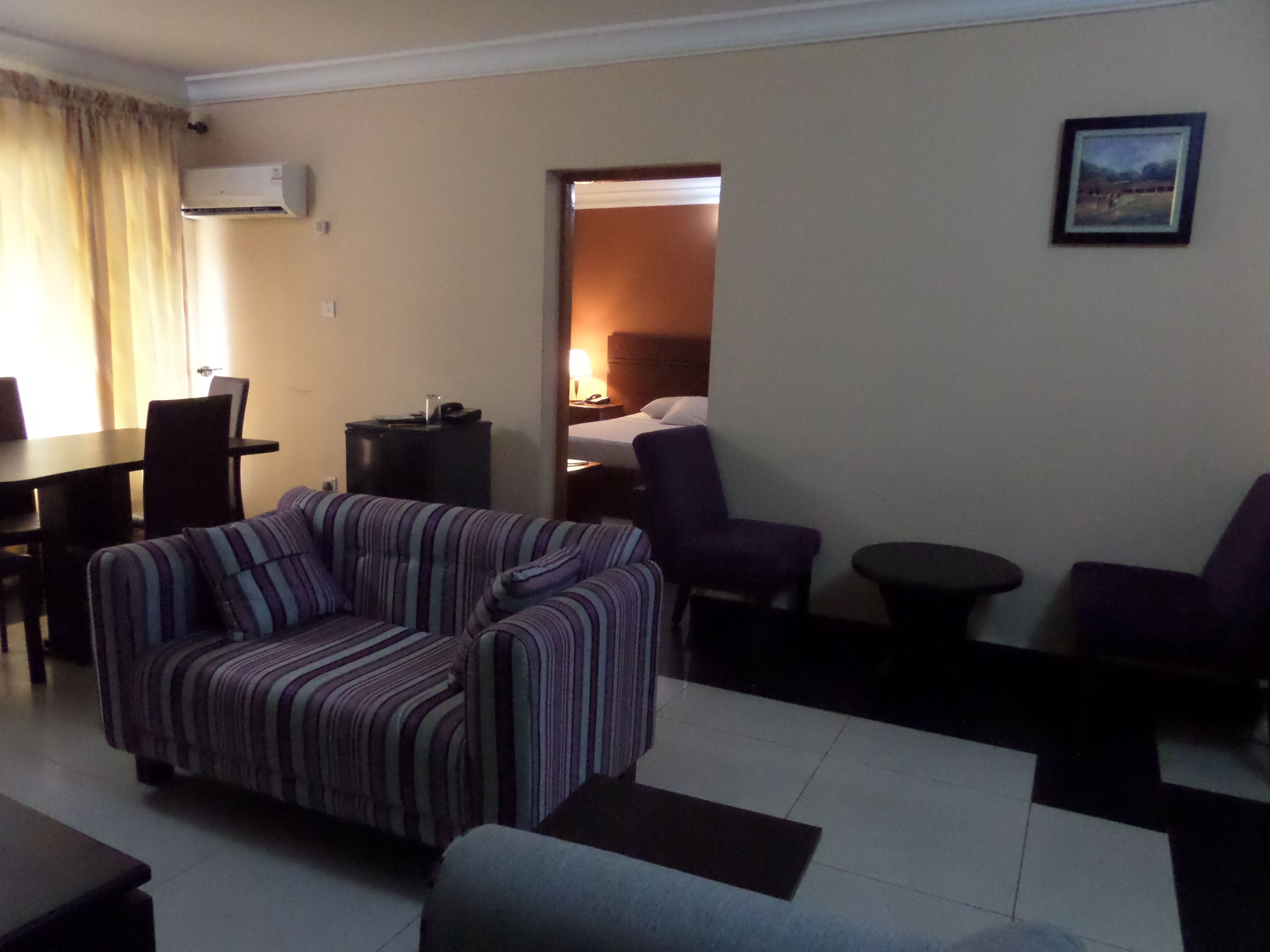 Royal Suite, 1 Bedroom | Living room | 32-inch flat-screen TV with cable channels, TV, pay movies