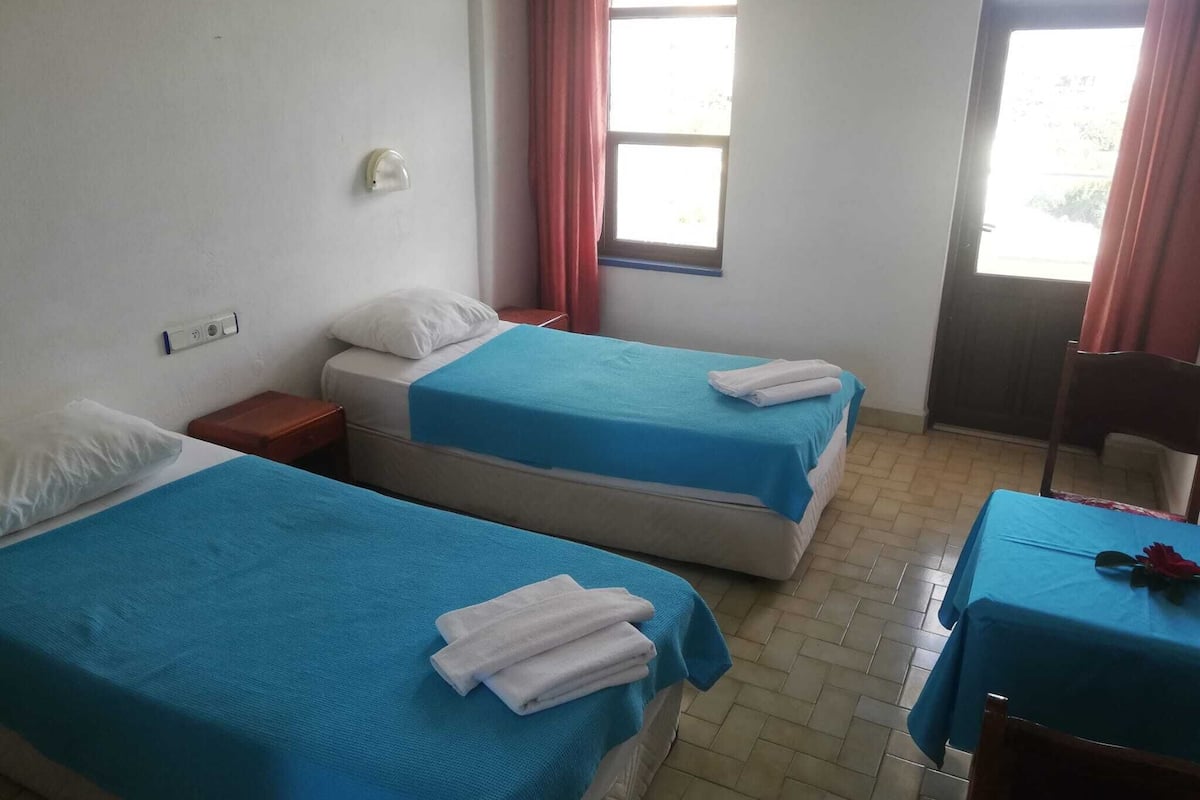 Desk, laptop workspace, free WiFi, bed sheets
