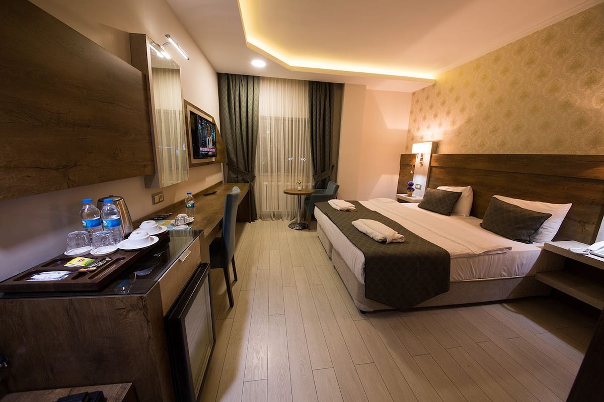 Chambre « Premier » | 1 chambre, literie de qualité supérieure, minibar