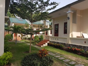 Deluxe Quadruple Room, 2 Queen Beds, Non Smoking, Garden View | Terrace/patio - Herbal Hotel & Spa (Phan Thiet)