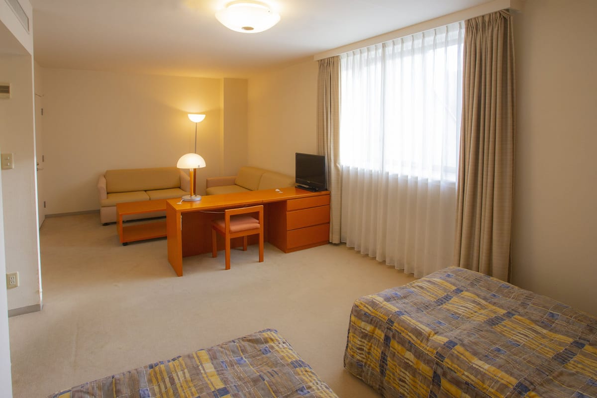 Premium Room, Multiple Beds | Desk, laptop workspace, blackout curtains, free WiFi