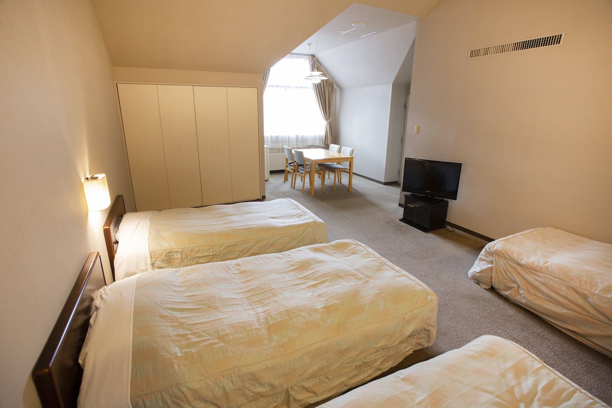 Premium Room, Multiple Beds | Desk, laptop workspace, blackout curtains, free WiFi