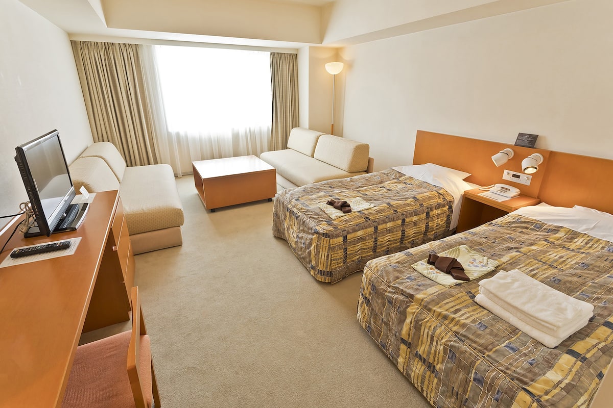 Desk, laptop workspace, blackout curtains, free WiFi