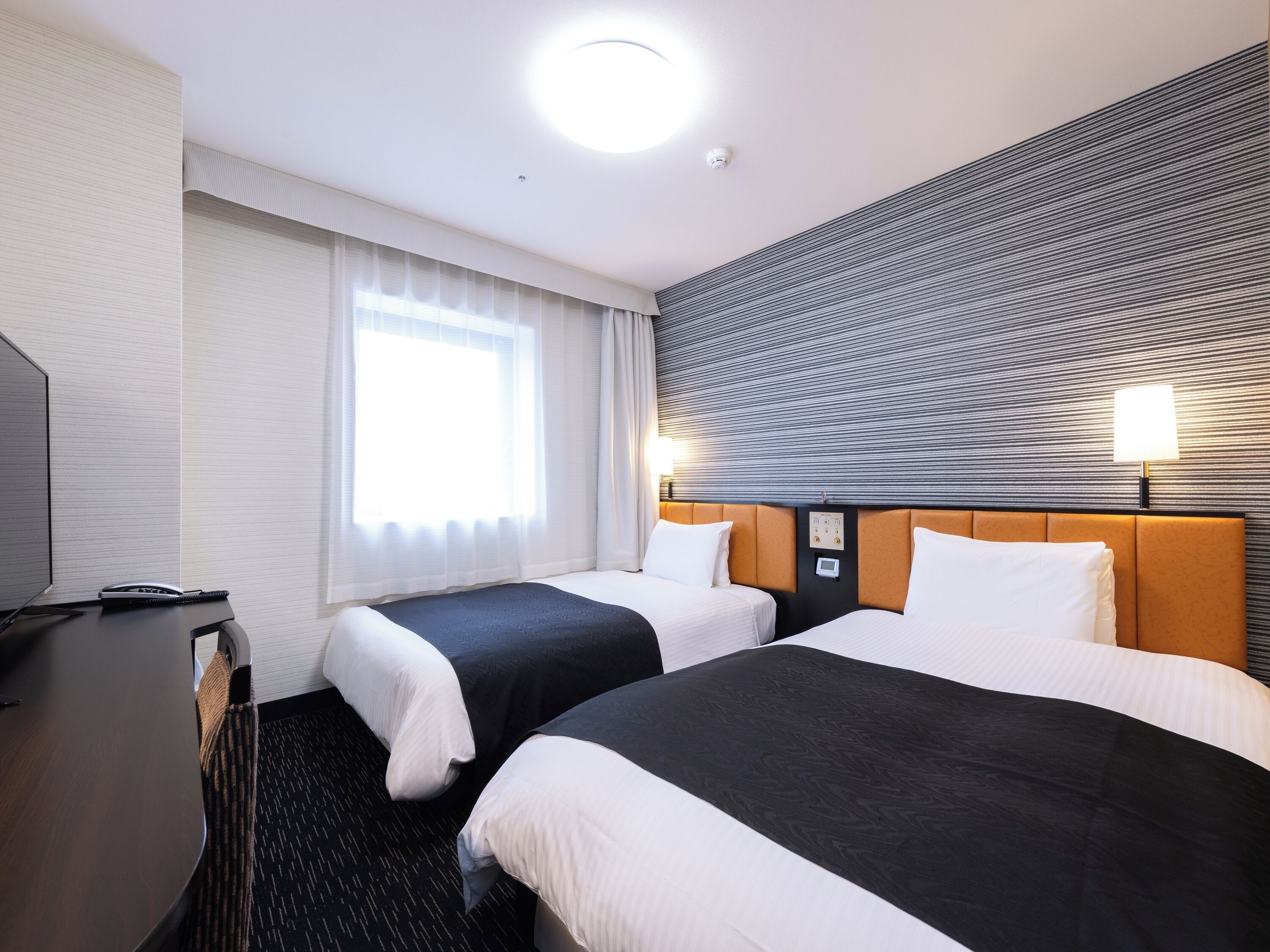 Desk, blackout drapes, free WiFi, bed sheets