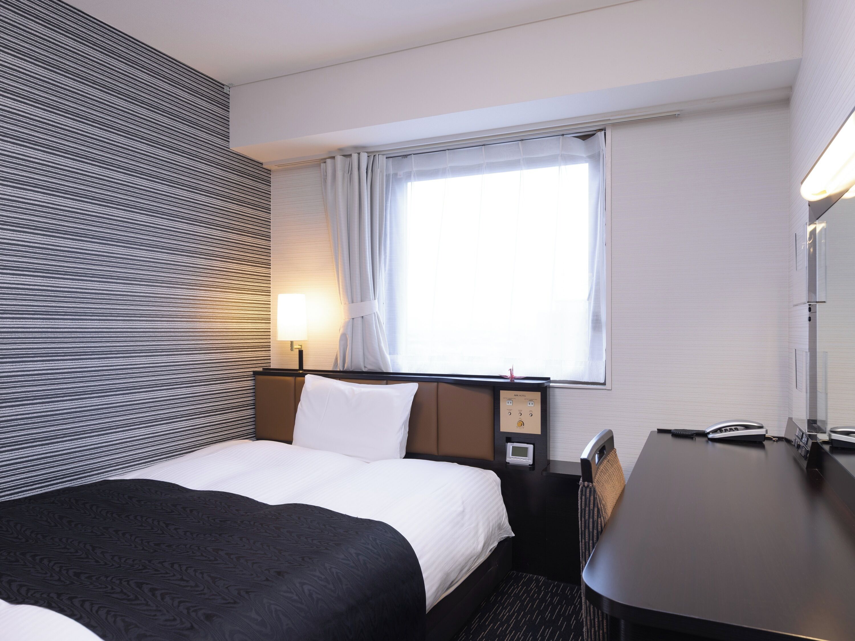 Desk, blackout drapes, free WiFi, bed sheets