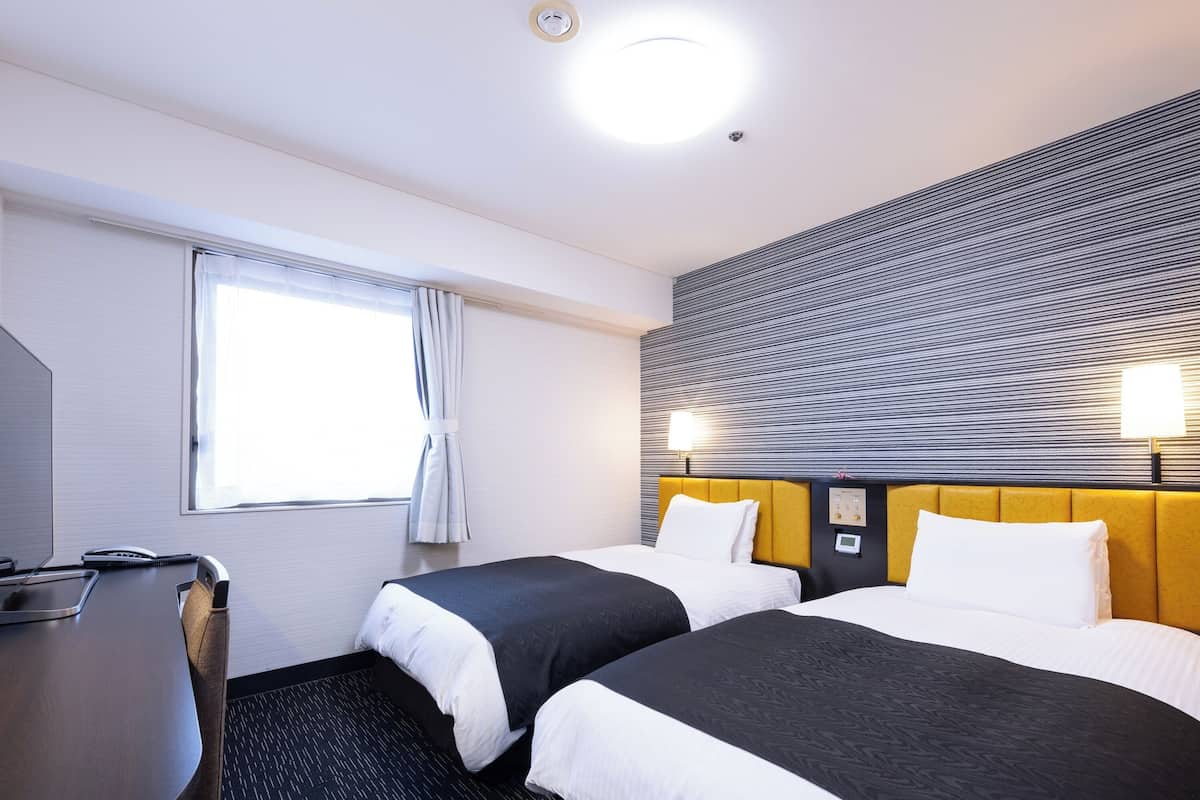 Desk, blackout curtains, free WiFi, bed sheets