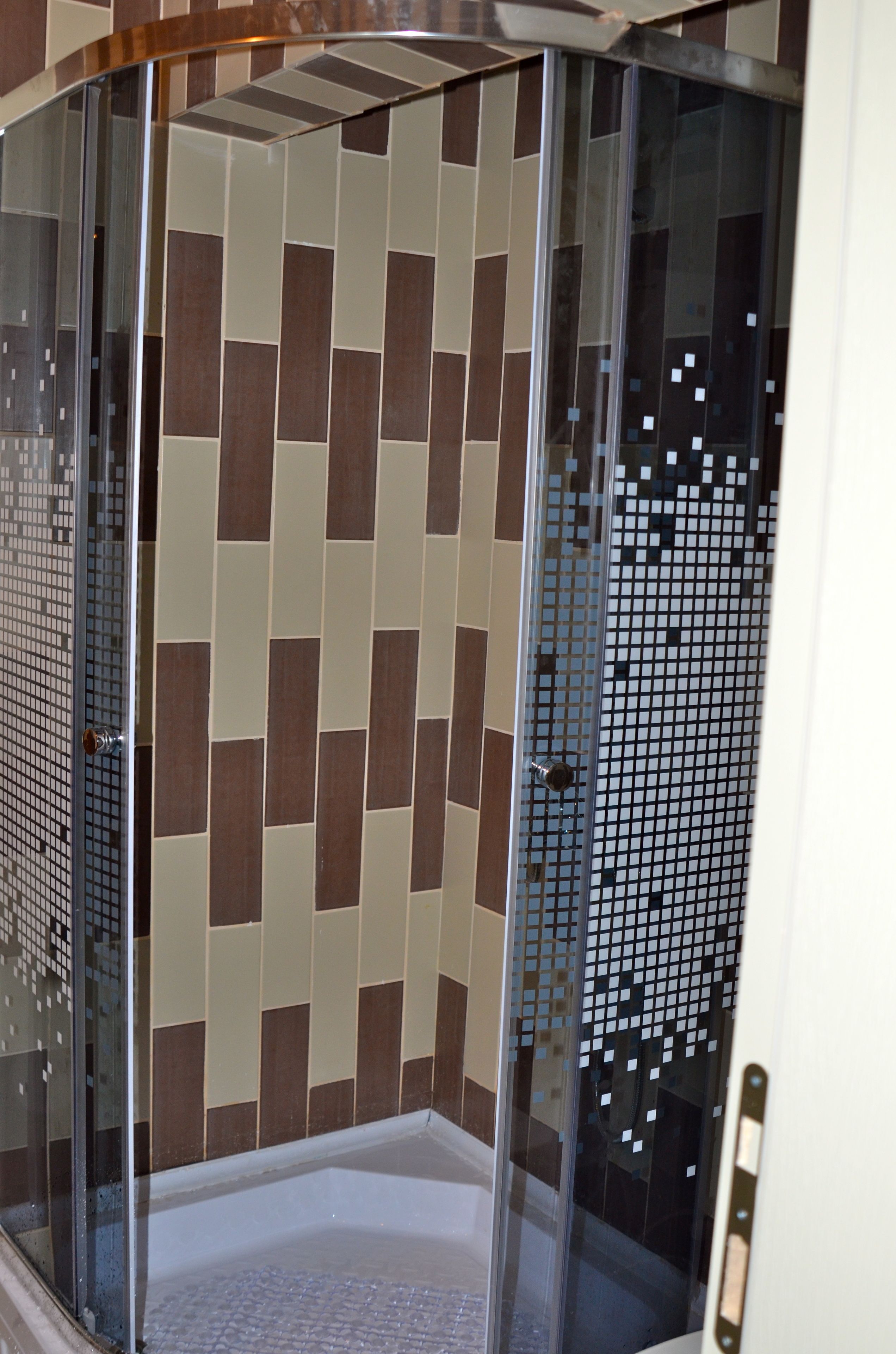 Shower, free toiletries, hair dryer, slippers