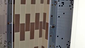 Shower, free toiletries, hair dryer, slippers