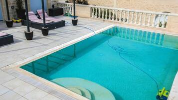 Outdoor pool, pool loungers