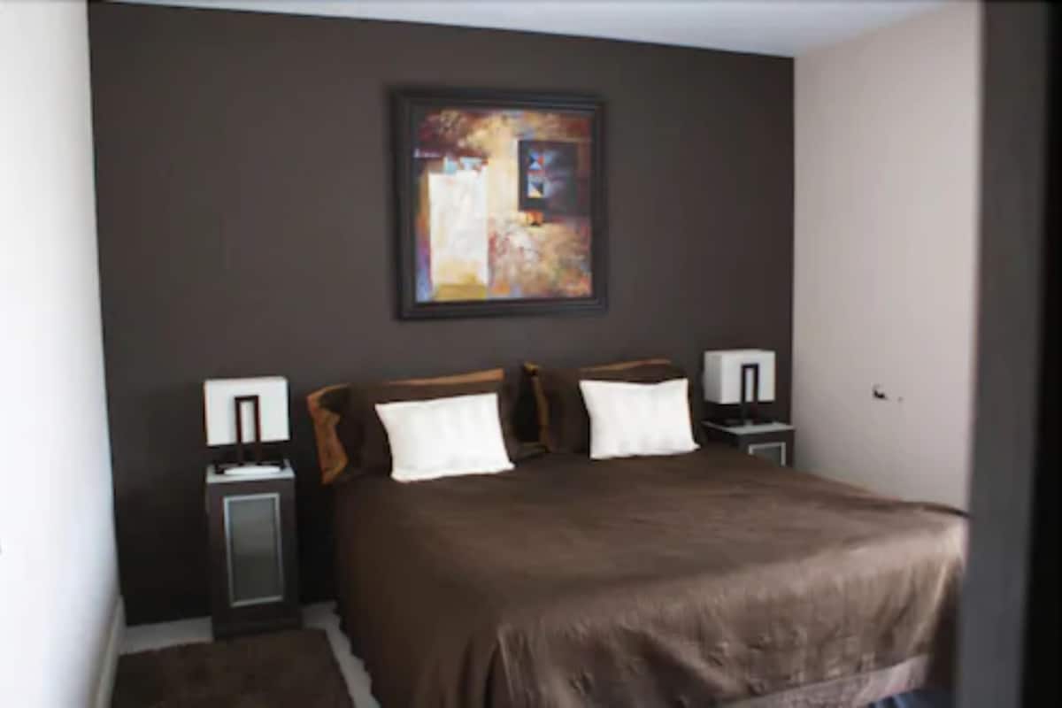 Deluxe Double Room | Premium bedding, blackout curtains, soundproofing, free cots/infant beds