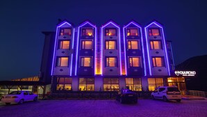 A hotel with a modern facade, multiple floors, and a prominent sign. - Diamond Hotel (Amasra)