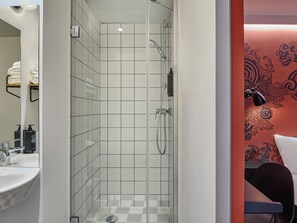 Shower, eco-friendly toiletries, hair dryer, towels