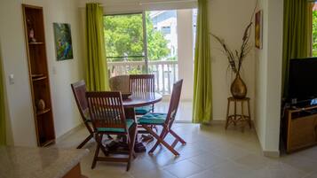 Apartment, 1 Bedroom | Living room | Flat-screen TV
