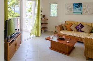 Apartment, 1 Bedroom | Living area | Flat-screen TV