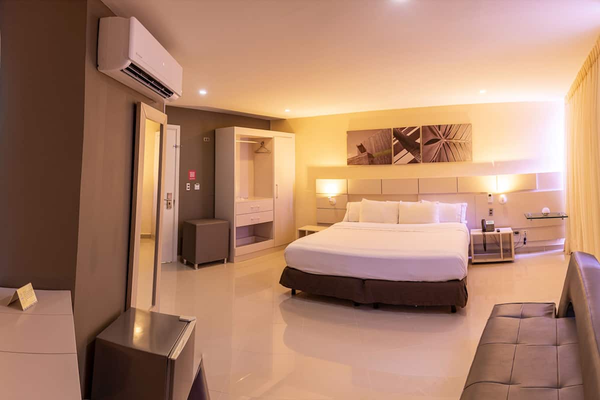 junior suite | 1 bedroom, minibar, in-room safe, desk