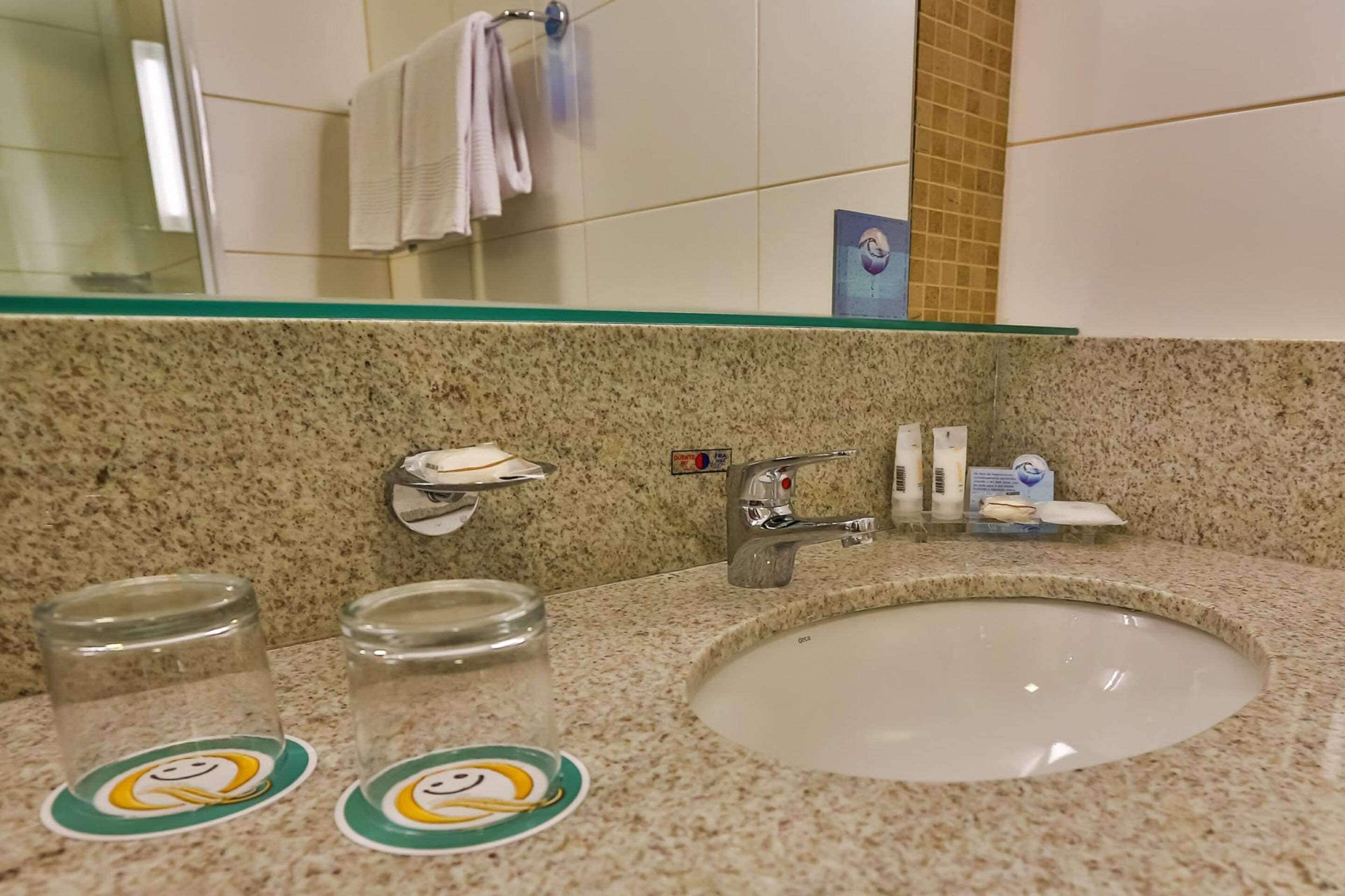 deluxe double room | bathroom | shower, free toiletries, hair dryer, towels