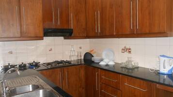 Suite, 3 Bedrooms, Ocean View | Private kitchen | Full-size fridge, microwave, oven, stovetop